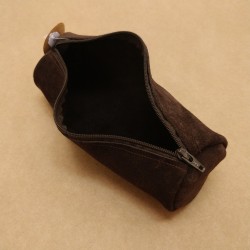 Trousse Ronde en Cuir retourné